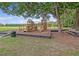 Community playground with climbing structures, slides, and swings for Gathering fun at 5084 Timber Race Crse, Hollywood, SC 29449
