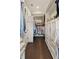 Spacious walk-in closet with custom shelving and storage for clothes, shoes and accessories at 55 Seagrass Ln, Isle of Palms, SC 29451