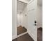 Home elevator with wood paneled walls and hardwood floors at 55 Seagrass Ln, Isle of Palms, SC 29451
