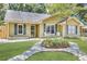 Charming single-story home with a lush front yard, walkway, and inviting facade at 703 Temple Rd # A, Ladson, SC 29456
