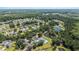 Community aerial view, displaying neighborhood pools, green spaces, and ponds at 7045 Stonecrop Ln, Johns Island, SC 29455