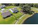 Aerial view of the home, showcasing the spacious backyard and proximity to a pond at 7045 Stonecrop Ln, Johns Island, SC 29455
