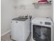Efficient laundry room featuring modern washer and dryer appliances at 7045 Stonecrop Ln, Johns Island, SC 29455