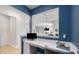 Office nook with a built-in desk and a view of the main living area, perfect for working from home at 7045 Stonecrop Ln, Johns Island, SC 29455
