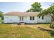 Backyard with brick house, french doors and flower boxes at 747 Brant Rd, Charleston, SC 29414