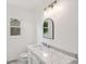 Bathroom features marble counters, chrome fixtures, and modern lighting at 747 Brant Rd, Charleston, SC 29414