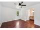 Bedroom featuring hardwood floors and ensuite bathroom with updated vanity at 747 Brant Rd, Charleston, SC 29414
