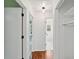 Hallway with wood floors with views of bedrooms and bathrooms at 747 Brant Rd, Charleston, SC 29414