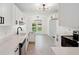 Bright, updated kitchen featuring white cabinets, stainless appliances, and modern fixtures at 747 Brant Rd, Charleston, SC 29414
