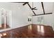 Large living room boasting beautiful hardwood floors, ceiling fan and French doors at 747 Brant Rd, Charleston, SC 29414