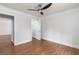 Bedroom with a ceiling fan, hardwood flooring, and closet at 7986 Highway 162, Hollywood, SC 29449