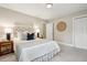 Bright bedroom featuring a decorative headboard and cool-toned accents at 8 Tovey Rd, Charleston, SC 29407
