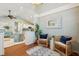 Elegant foyer featuring hardwood floors, stylish decor, and seamless flow into the bright, airy living area at 8 Tovey Rd, Charleston, SC 29407