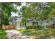 Inviting exterior view of a single story home, featuring a freshly painted exterior and a well manicured lawn at 8 Tovey Rd, Charleston, SC 29407