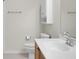 Bathroom with white cabinets, sink, and toilet at 8800 Dorchester Rd # 2004, North Charleston, SC 29420