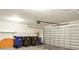 Garage with door, storage, and trash cans at 8800 Dorchester Rd # 2004, North Charleston, SC 29420
