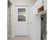 Well-lit laundry room with white cabinets and modern washer/dryer hookups at 8800 Dorchester Rd # 2004, North Charleston, SC 29420