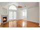 Open-concept living room with vaulted ceilings, fireplace, and abundant natural light at 8800 Dorchester Rd # 2004, North Charleston, SC 29420