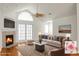 Staged living room with fireplace, plush seating, and stylish decor at 8800 Dorchester Rd # 2004, North Charleston, SC 29420