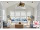 Staged sunroom with vaulted ceilings, bright furniture, and plentiful light at 8800 Dorchester Rd # 2004, North Charleston, SC 29420