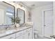 Bright bathroom with double vanity, granite countertops, and modern fixtures at 914 Dill Ave, Charleston, SC 29412