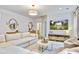 Cozy living area with a large sectional sofa, a marble coffee table, and a wall-mounted television at 914 Dill Ave, Charleston, SC 29412