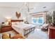 Serene main bedroom with a vaulted ceiling, a large bed, and a decorative chandelier at 914 Dill Ave, Charleston, SC 29412