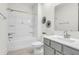 Clean bathroom with a tub-shower combo, gray vanity, and modern fixtures for a functional space at 1009 Field Sparrow Dr # Cc3-2-6, Ravenel, SC 29470