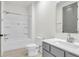Well-lit bathroom features a shower-tub combo, modern vanity, and neutral tones for a clean aesthetic at 1009 Field Sparrow Dr # Cc3-2-6, Ravenel, SC 29470