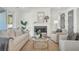 Cozy living room with fireplace, comfortable seating, neutral color palette, and lots of natural light at 1009 Field Sparrow Dr # Cc3-2-6, Ravenel, SC 29470