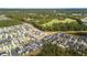 An expansive community surrounded by woods, dotted with homes and scenic ponds at 105 Philips Park St, Summerville, SC 29486