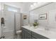 Bright bathroom featuring a double vanity with white countertops and ample space, offering both style and functionality at 105 Philips Park St, Summerville, SC 29486