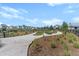 Community garden featuring lush landscaping, winding pathways, and abundant greenery at 105 Philips Park St, Summerville, SC 29486