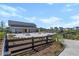 Community gathering space with picnic tables and yellow umbrellas for shade at 105 Philips Park St, Summerville, SC 29486