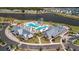 Aerial view of a resort-style pool, amenity center, and beautifully landscaped grounds at 105 Philips Park St, Summerville, SC 29486