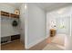 Entryway featuring built-in storage, coat hooks, and access to other areas of the home at 105 Philips Park St, Summerville, SC 29486