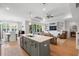 Open concept living space flows from the kitchen island to living room built-ins and dining area at 105 Philips Park St, Summerville, SC 29486