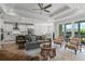 Open-concept living area with modern finishes, connecting the kitchen and dining spaces at 105 Philips Park St, Summerville, SC 29486