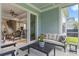 Relaxing screened patio featuring a stylish seating area with sliding glass doors at 105 Philips Park St, Summerville, SC 29486