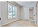 Bedroom with hardwood floors, neutral walls, and a bright window with natural light at 1052 Yorktown Dr, Charleston, SC 29412