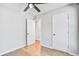 Cozy bedroom featuring a ceiling fan, wood floors, and closet at 1052 Yorktown Dr, Charleston, SC 29412