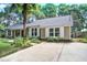 View of home's exterior featuring well-maintained lawn, driveway, and traditional siding at 1052 Yorktown Dr, Charleston, SC 29412