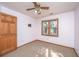 Neutral bedroom with ceiling fan and a sunlit window view at 107 Joes Ln, Summerville, SC 29486