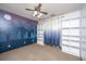 Carpeted bedroom accented with a mural and built-in shelving at 107 Joes Ln, Summerville, SC 29486