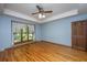 Bedroom featuring a ceiling fan, hardwood floors, and a closet at 107 Joes Ln, Summerville, SC 29486