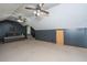 Finished bonus room with sloped ceiling, fans, carpet, and stairs at 107 Joes Ln, Summerville, SC 29486