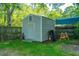 Storage shed in backyard behind a wood fence at 107 Joes Ln, Summerville, SC 29486