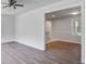 Bright living room with hardwood floors, neutral walls, and modern trim at 1112 Yeamans Hall Rd, Hanahan, SC 29410