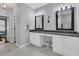 Bathroom vanity with dual sinks, framed mirrors, and white cabinets at 112 Riviera Dr, Summerville, SC 29483