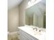 Bright bathroom featuring a white vanity, large mirror, and tiled floors at 114 Grand Palm Ln, Summerville, SC 29485